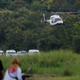 A helicopter carries one of the rescued boys to a hospital in Chiang Rai.